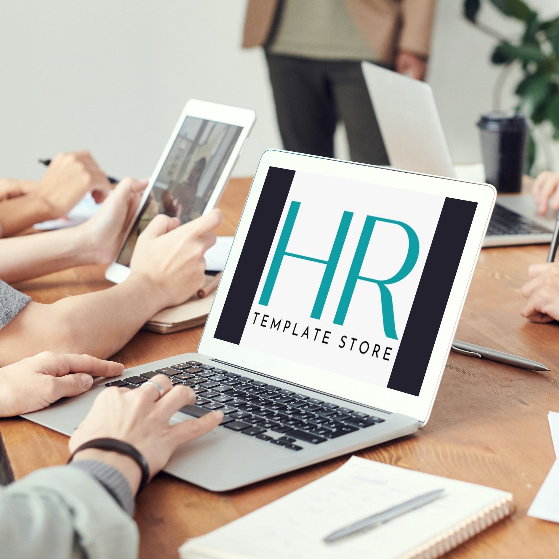 The HR Template store logo appears on a laptop with employees around a conference table.